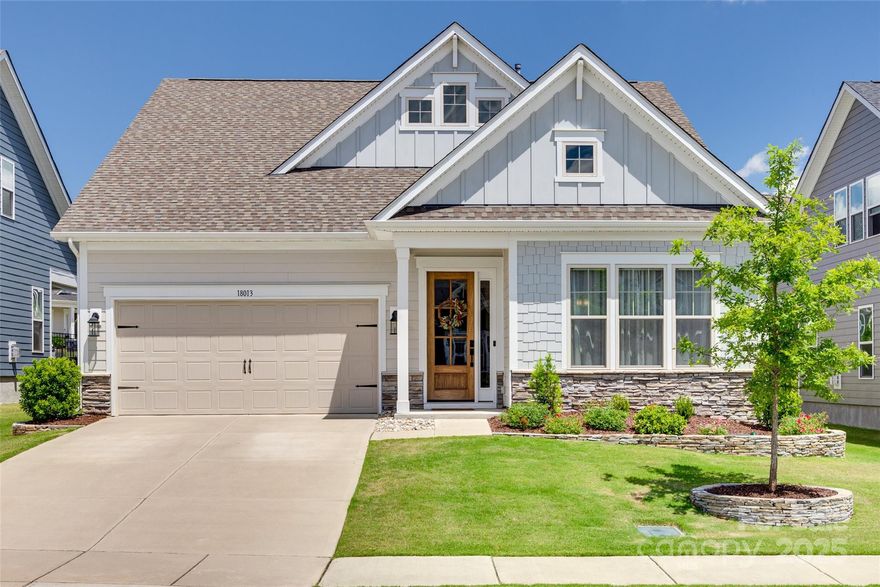 Welcome to your stunning new home, in a desirable community on shore of Lake Wylie. Minutes from shopping and restaurants, convenient to all that Charlotte offers, and just 24 minutes from the airport. Meet your friendly neighbors at pickleball, tennis, swimming and social events in the Palisades, all included with your HOA social membership. Lawn care is covered by the HOA, and the extended composite deck is maintenance-free. You’ll love the soaring ceilings, open floor plan and luxury features like motorized shades. A private guest suite and a flexible office/living space offer versatile comfort. Your gourmet chef’s kitchen boasts a custom walk-in pantry with beverage cooler, extended cabinetry, and sparkling marble backsplash. Designer light fixtures, wall features and finishes offer wow-factor throughout. The primary suite includes an oversized shower and custom closet with laundry chute. Upstairs, enjoy a large bonus room, bedroom, and full bath—perfect for game nights or guests.