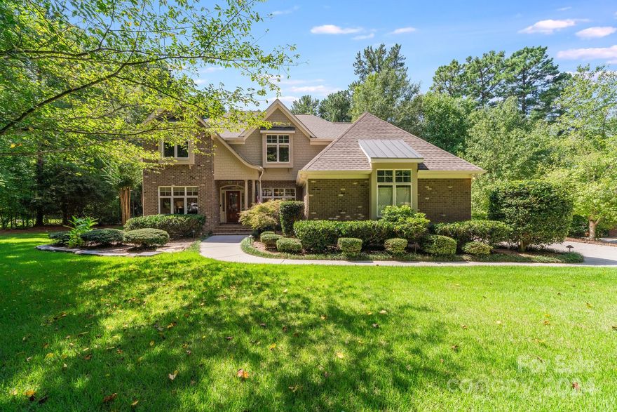 MULTIPLE OFFERS RECEIVED.....SELLER REQUESTS HIGHEST AND BEST BY 5:00 TODAY SATURDAY 8/24/24. 
SELLER WILL REVIEW WITH NOTIFICATION BY SUNDAY 8/25/24... Built by OConnell Signature Homes this beautiful brick two story has three car garage.  Gorgeous wooded lot with plenty of privacy to enjoy.  Lovely foyer opens to beautiful dining area.  Open concept views into family room & kitchen makes for easy conversations with friends.  Large kitchen with granite and kitchen table area.  The floor to ceiling windows give an open view to the wooded lot You can enjoy the screened porch & patio with hot tub.  Primary on the main  had vaulted ceilings and expansive windows for natures view.  Completely renovated ensuite w/ dual vanities, dual closets, oversized shower & free standing tub, truly a SPA RETREAT !  Upper level has 3 bedrooms & Rec. area for that extra tv space or however you need to utilize.  Attention to every detail with hardwoods on first level, heavy millwork !
Large 3 car garage