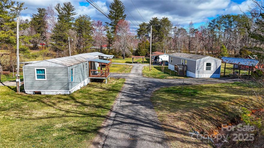 Attention Investors! Mobile Home Park with four mobile homes. All homes have a detached carport. There are 2 homes with two bedrooms, one bath and two homes with two bedrooms, two baths. One home is newer than the others, purchased February 2023. Park has strict rules and is very quiet and well maintained. Storage building is on the property for maintenance equipment. Call for further questions/showings. No drive-bys please. Acreage is approximate until survey is completed.