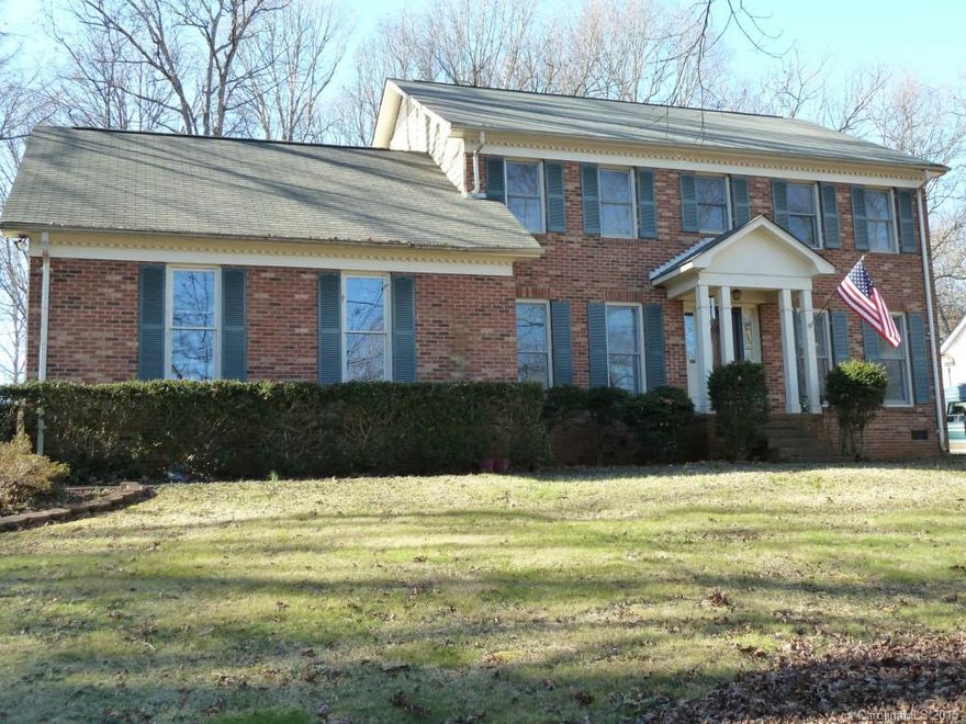 Welcome Home to this  traditional yet versatile four bedroom or 3+ bonus home.  Living Room affords private office use.  Dining Room easily seats 10.  Cozy up to the masonry fireplace in the spacious Den. Imagine relaxing, playing games or enjoying brunch  in the glorious sunroom.  Well-designed Kit features menu planning desk & large pantry. Bay window in the Brkfst Nook is a sunny place for morning coffee to brighten your day. Master Bath w/large shower.  Bedrooms are roomy w/large closets.