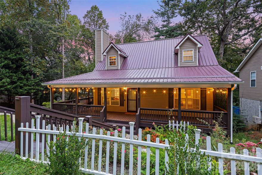 Nestled on a quiet cul-de-sac just minutes from Asheville, this 4BR/3.5BA, 1.5-story Cape Cod offers over 2,400 sq ft of versatile living space. The main-level primary suite features a spa-inspired bath with jetted tub, while the open-concept living area boasts a cozy gas fireplace and a bright kitchen with an eat-in bar and bay window. Recently refreshed, the home has been fully repainted inside, with the back deck extended and restained. complete with a firepit for outdoor enjoyment. The yard is beautifully landscaped with perennials, and a small shed, with a partially fenced backyard providing both charm and privacy. With a simple, clean interior, this home is a blank canvas ready for your personal touches. The finished walkout basement adds extra living space. Additional upgrades include wood floors, dual heat pumps, and convenient access to I-40 and the Buncombe County Sports Complex. Thoughtful updates and open potential make this a rare opportunity to create your ideal home.