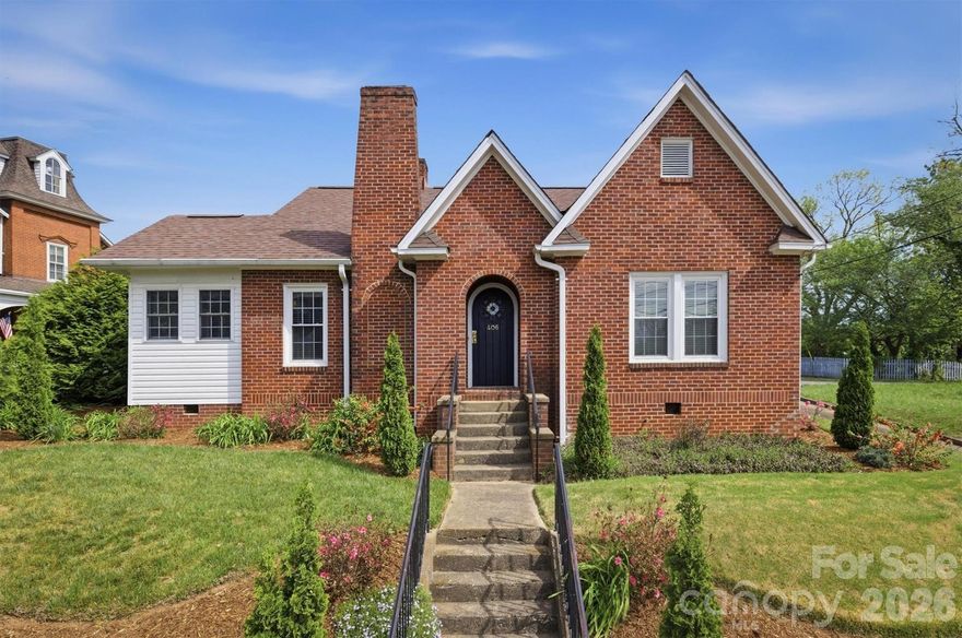 Adorable home with beautifully maintained landscaping, all within walking distance to Downtown Morganton! This 2-bedroom, 1-bath home offers convenient one-level living with a functional and inviting layout. This updated home features a cute kitchen with a nearby laundry closet, a formal dining room, and a spacious living room complete with cozy gas logs. An additional flex room provides the perfect space for a bedroom, sitting room, or home office. The unfinished basement offers potential for storage. Step outside to a generous deck—perfect for grilling, entertaining, or simply relaxing. Enjoy a move-in ready home in a location that keeps you close to everything Morganton has to offer!
