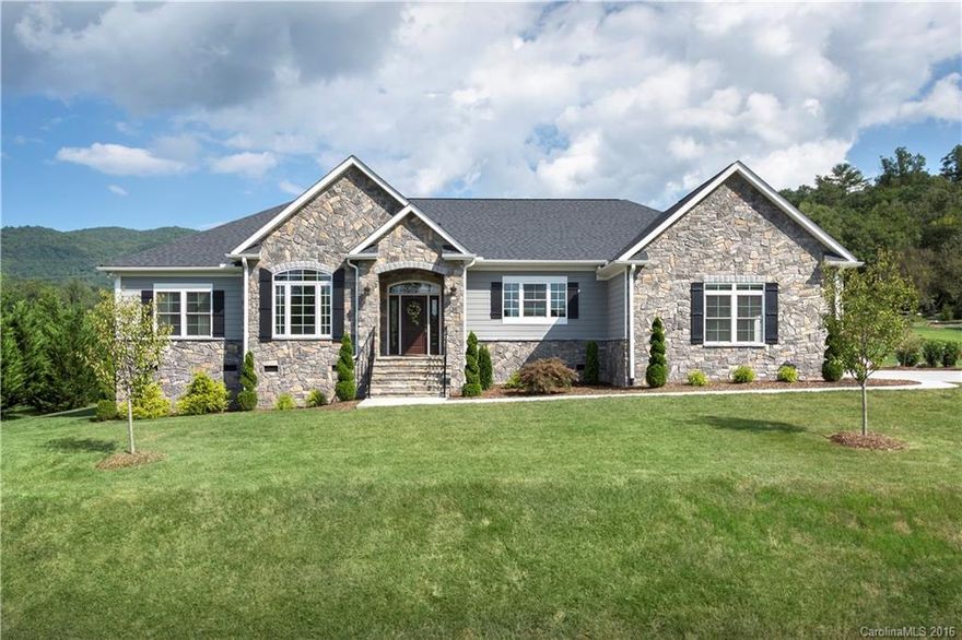 New 2016 Construction. Elegant Country Home in gated Monarch Estates located in the Cane Creek Valley. Beautiful views of Little Pisgah and Bear Wallow mountains. Professionally decorated. Custom millwork throughout. 14' Ceilings with exposed wood beams. Deep Crown molding and wainscoting, tongue and groove built-ins, 42" Wood Burning Fireplace, Large screened in porch off the back. Quartz Counters, Subway Tile, Class Mosaic Backsplash, Large Carrera Marble Shower and marble surround jetted tub.