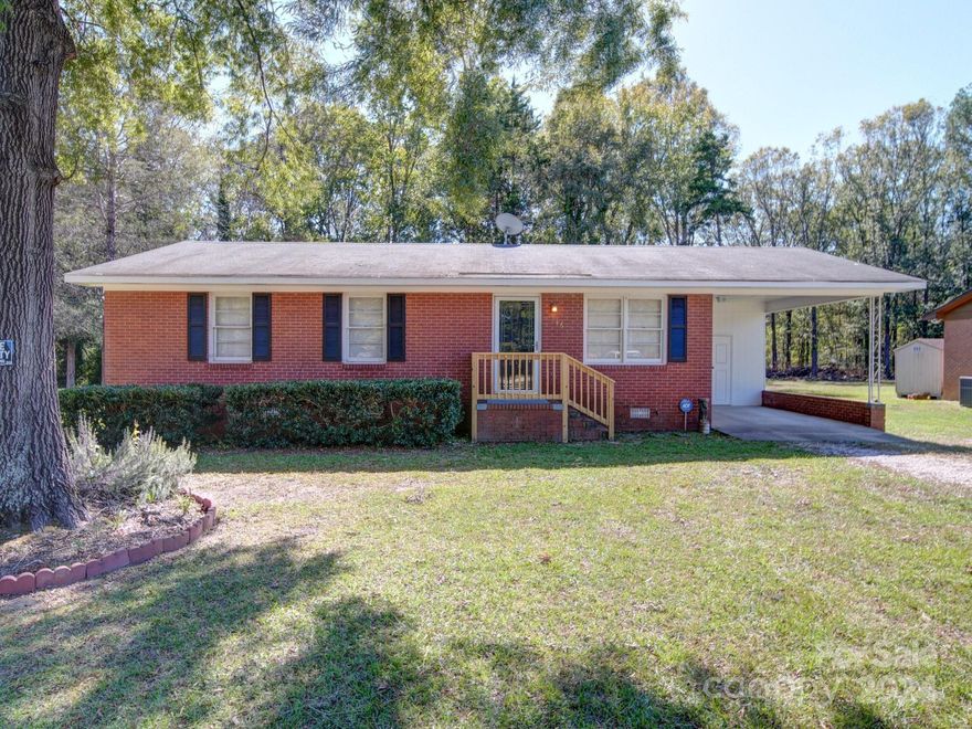 Discover a fantastic opportunity with this low-maintenance all brick home located in Chester, SC. Recently updated with fresh paint and new flooring, this residence boasts appealing features throughout. Enjoy the convenience of a covered carport located near the side entrance. The spacious lot offers plenty of room for outdoor entertainment, pets, or gardening. This charming home is move in ready, schedule your showing today!