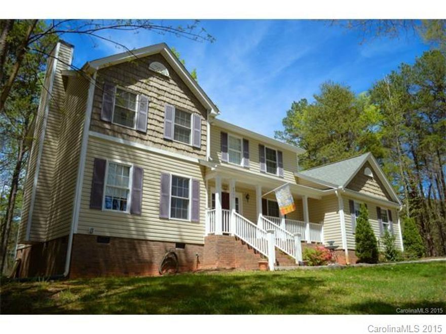 Very nice home on quiet street with large detached garage as well as attached garage. car lovers dream home. Move in condition with seasonal water-views, kitchen is open to breakfast nook, also has formal dining room, a large living room with fireplace.This home was built for entertaining, just around the corner from community lake access, Priced to sell, 100% financing available. and just down the street from the Village at Sherrills ford coming soon!