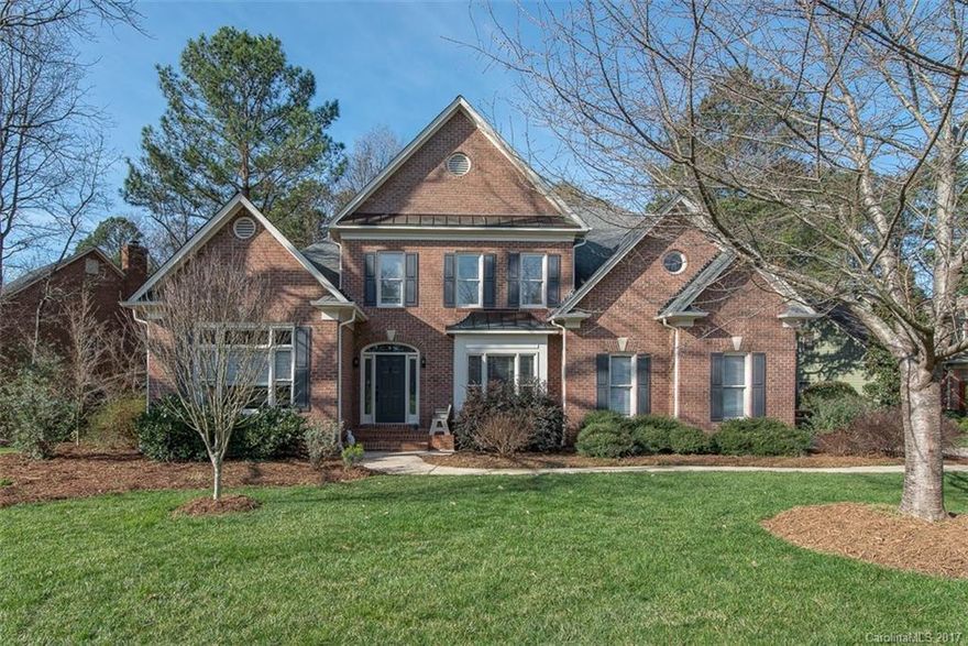 Spectacular 2 story home in Berkeley loaded with updates and situated on the perfect corner lot with wooded back yard!  Kitchen with quartz, backsplash, S/S appliances, island w/new downdraft cooktop opens into the Great Room with bar seating. Beautiful colors, finished on site hw floors, renovated bathrooms including an exquisite master bathroom with lots of storage. Unparalleled schools, walking distance to shops and restaurant. Immaculate & ready to move in. 13 month home warranty included.