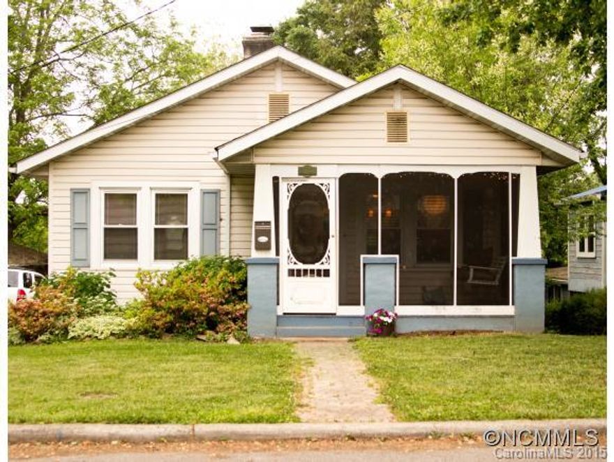 An adorable W. Asheville cottage on a popular street! Thoughtful renovations include a complete kitchen remodel w/ a farmhouse sink, butcher block counters, beautiful cabinetry, stainless appliances & gas cooktop. New bathroom with tile, storage and a chic sink/cabinet. Open LR & DR w/ gas FP. Replacement windows, central A/C, screened in porch & back deck to deep yard and fire pit. Buyers can't move until 7/1! W/D can be moved to back porch.