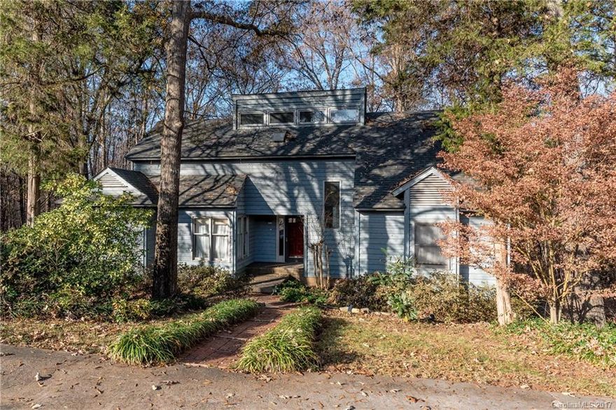 Country living close to shopping, restaurants and highways tucked away in the woods. granite kitchen, heated porcelain tile floor, new roof 2011. Cathedral ceiling in great room. Curbless shower with linear drain and full body and rainfall shower in master suite. multiple decks. storage potting shed building. basement with wet bar