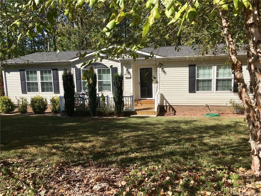 Awesome ranch plan looks never lived in. Great layout. Huge kitchen. Mud room with drop zone in laundry. Split plan with large master and master bath has tiled surround garden tub. Stacked stone fireplace. Firepit out back and storage building will convey. Wooded 1 acre lot! Great price and value.
