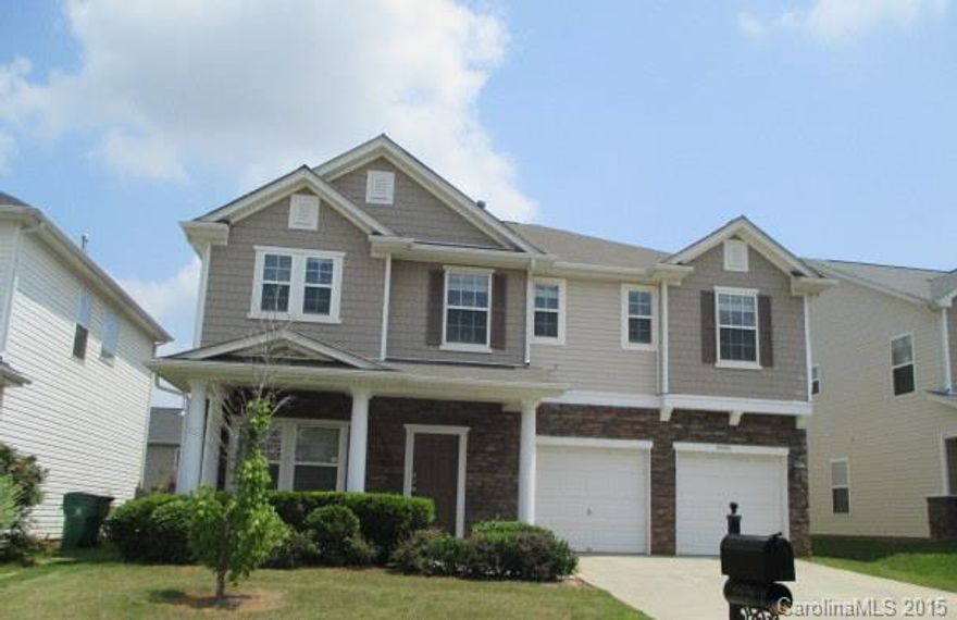 Beautiful 5 bedroom, 3 full bath 2 story home with brand new kitchen with ample cabinets and fireplace. This home is spacious with hardwood floors and carpet throughout. The home has fresh paint and new carpet. Master bedroom has trey ceiling and double sink. Neutral colors throughout. Home has lots of natural light. This is a must see!