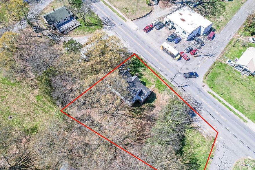 Back on market due to no fault of the seller. Fantastic retail, office opportunity with great road frontage exposure! Just under 0.5 acre corner lot  on a high traffic Belmont Mt Holly road. The property has 1 existing commercial building and a small parcel of commercial land. This could be a perfect match for small business owners or investors. The city is also open to redevelopment. 

This listing can be sold together with the adjacent property MLS# 4009134

Price reductions due to repairs needed.