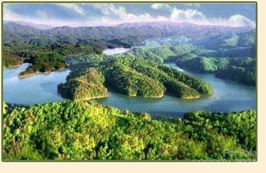 Close to Lake and Marina - 2.59 Acres Lot 34-1 in Fontana Lake Estates! Lot has a driveway and house pad cut in and expired septic permit on file. Possibility of multiple build sites including at the top of the lot facing SW for a possible great long range view with some treetop clearing. Your property value will be protected with high end amenities, such as: wide paved roads; underground utilities; picnic area at the lake; private marina and hiking trails; and protected/controlled development, as well as sensible covenants/restrictions that permit rentals if so desired. Beautifully Peaceful!  Call and go - agent needs gate code.