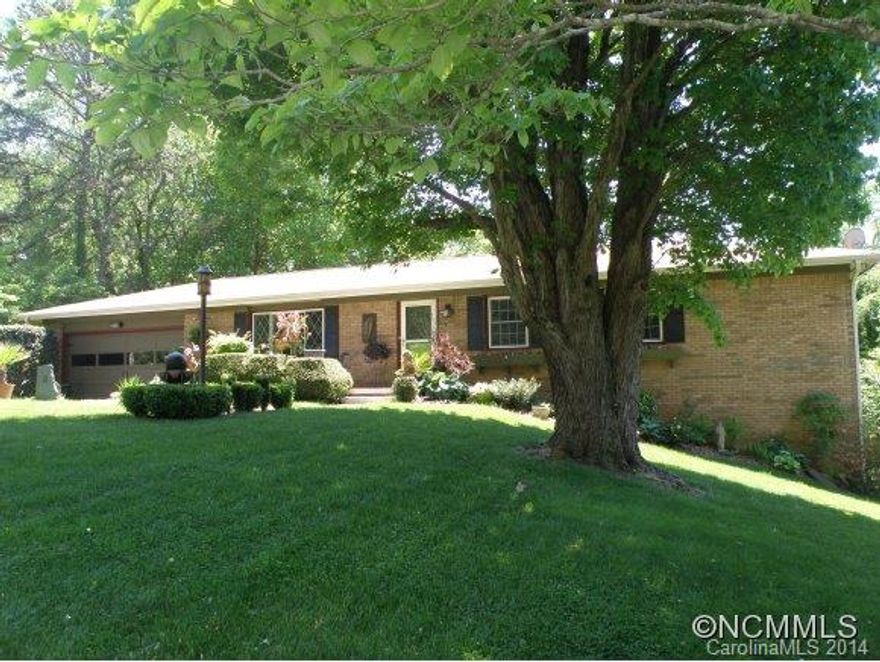 Totally updated rancher, spacious living room, extremely well landscaped .38 acre lot  w/great backyard, AHS Home Warranty, attached 2-car garage, hardwood and tile floors, updated kitchen, newer ht pump, covered rear porch, blacktop drive, architectural  shingle roof.  BR, 2 full baths, great Tiny Farms location, quiet neighborhood, immaculate, pleasant to show, very nice lot