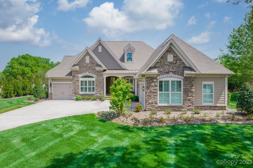 Beautiful luxury Toll Brothers home in Weddington’s desirable Bromley neighborhood w/fantastic outdoor living space with heated saltwater pool. Wonderful curb appeal w/landscaping throughout yard, low-voltage landscape lighting, and front/back/drip irrigation. Outdoor living space with rocking-chair front porch, covered side porch w/TV mount & ceiling fan, grilling area, travertine raised patio overlooking spacious travertine pool deck & fenced back yard. Indoors, you'll find custom touches and conveniences throughout, such as the bar with wine chiller, extensive trim work, prefinished wide-plank wood floors, & trendy decor/lighting. The kitchen is a chef's delight with high-end appliances including double ovens and the newest induction stovetop. The primary suite has a huge walk-in custom closet w/laundry room access. The primary bath is a showstopper! Storage galore; all closets & garages have custom systems by “Closets by Design”. This home is simply stunning, both inside and out!