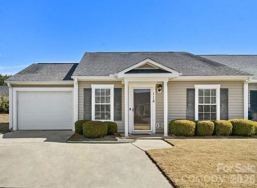 Welcome to 118 Ansley Court, a well-maintained end-unit townhome located by the cul-de-sac with a fully fenced backyard and manicured landscaping. The kitchen offers white cabinetry, ample counter space, matching appliances, and bar seating for additional dining or entertaining. Inside, a bright, open layout features wood flooring throughout the main living areas and recessed lighting for a clean, updated feel. The spacious living room flows easily into the dining area and kitchen, creating a functional everyday layout.  The primary suite provides generous space along with a private bath featuring a large vanity sink and a tub/shower combination. A comfortable secondary bedroom and full guest bath complete the interior. Step outside to a covered patio overlooking the fenced backyard a fully usable outdoor space ideal for relaxing, pets, or entertaining. End-unit setting, open surroundings, and move-in ready condition, this home delivers low-maintenance living in one of the community’s most desirable positions. Schedule your showing today.

Seller is open to buyer concessions with acceptable offer. Please include any requests in submitted terms. 
Agents schedule your appointments in Showing Time at 800-746-9464.