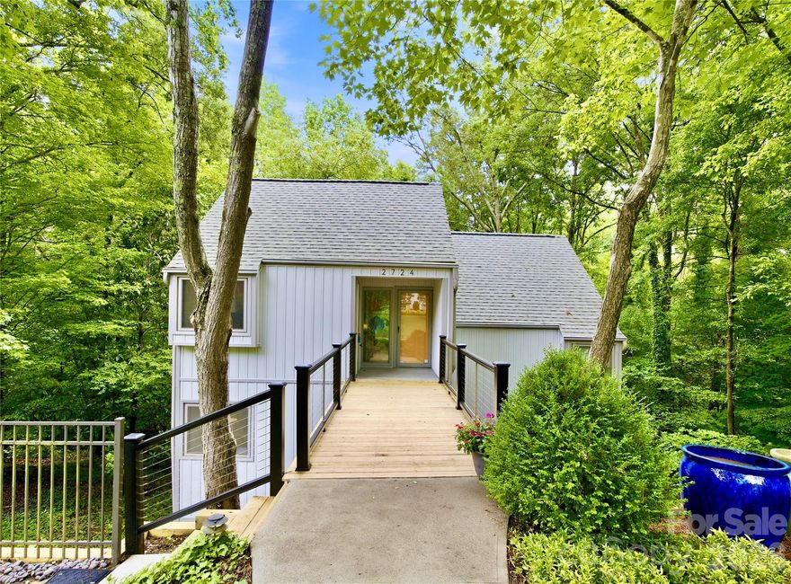 Nestled into a lush, wooded setting in sought-after Huntingtowne Farms, this one-of-a-kind multi-level home feels like your own private retreat while also being minutes to Uptown, Southpark, and Quail Hollow Country Club.  Designed to embrace the landscape, the unique layout creates warm, inviting spaces filled with character, light, and connection to the outdoors. Every level has an expansive open deck attached for enjoying a morning coffee or dining al fresco.  If you need more steps on your Fitbit, the entrance to the Little Sugar Creek Greenway is at the end of your street, where you can bike all the way to South Carolina and back. Or join the local Southpark Swim & Tennis, a popular community-owned club, with currently no waitlist for Tennis-Only memberships! With 4 large bedrooms and 3 full baths, this home offers maximum flexibility for functionality. The lower level, currently used as the primary bedroom suite, offers exceptional versatility and could easily function as a spacious bonus room, media room, fitness space, or private guest retreat depending on your needs. If you’ve been searching for something beyond the ordinary — a home with personality, privacy, and a true indoor-outdoor feel — this Huntingtowne Farms retreat delivers a rare opportunity to add your own flair and create your own oasis in the city.