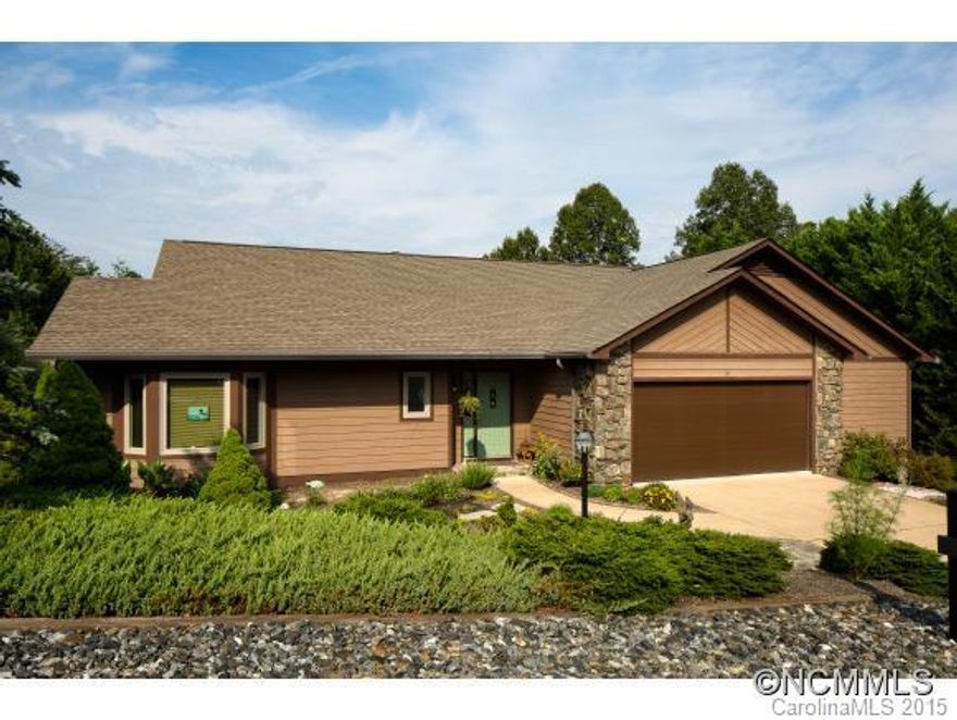 This renovated home has a master on the main level and boasts a stunning garden ideal for gardeners and nature lovers. House features include vaulted ceilings, oak and bamboo floors, a spacious kitchen with eat-in area, office, screened porch off master, a bedroom & bonus space on lower level, 2 large decks, garden with composted, irrigated beds, Koi pond with waterfall, patio area with sun shade & fire pit, & blueberry and blackberry trellis.