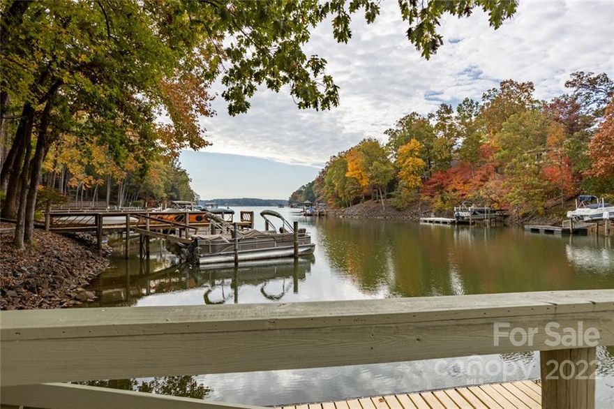 This Beautiful 3 Bedroom, 3 & 1/2 Bath Home in the Gated, Golf/Lake Wylie Community of River Hills Has It All! Enjoy Lake Living w/Your Own Deeded Boat Dock.  This Gorgeous Home is on a Private Wooded .40 Acre Lot, Features a Grand Open Flooplan w/a Large Kitchen w/Breakfast Nook!  Entering You'll find a welcoming Foyer with Lovely Hardwoods, Formal Dining & Living Rooms w/New Carpet and Fresh Paint! Wonderful 40ft. Deck off the Living & Dining Rooms, Overlooking Gently Sloping/Wooded Landscaping. 3 Bedrooms on the Upper Level Feature New Carpet and Paint.  Both HVAC Recently Replaced, the Lower Unit in 2017 and the Upper Unit in 2019. The Pier and Deeded Dock are Located at the End of the Cul-De-Sac within a Two Minute Walk of the Home. The Basement is an Amazing Man Cave, Perfect for Entertainment/Billiards, a Fabulous Wet Bar, Full Bath & More!. Own a Piece of Lake Wylie, w/Low S.C. Taxes, Highly Rated Clover Schools & Just Minutes from Great Restaurants on & Much More!