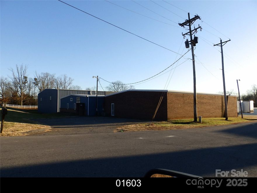 FOR COMP PURPOSES ONLY. Property contains two buildings connected by a tunnel. PID#01603-1.044 acres-Built 1976, appx 10848sf, contains offices, breakroom, and warehouse space with 20ft ceilings and dock. PID#75922-.906 acres-Built 1997, appx 20705sf, contains warehouse space with 30ft ceilings and 2 docks. Previously used by Temp Vent and most recently, Lintex Fabrics. Septic system, county water.