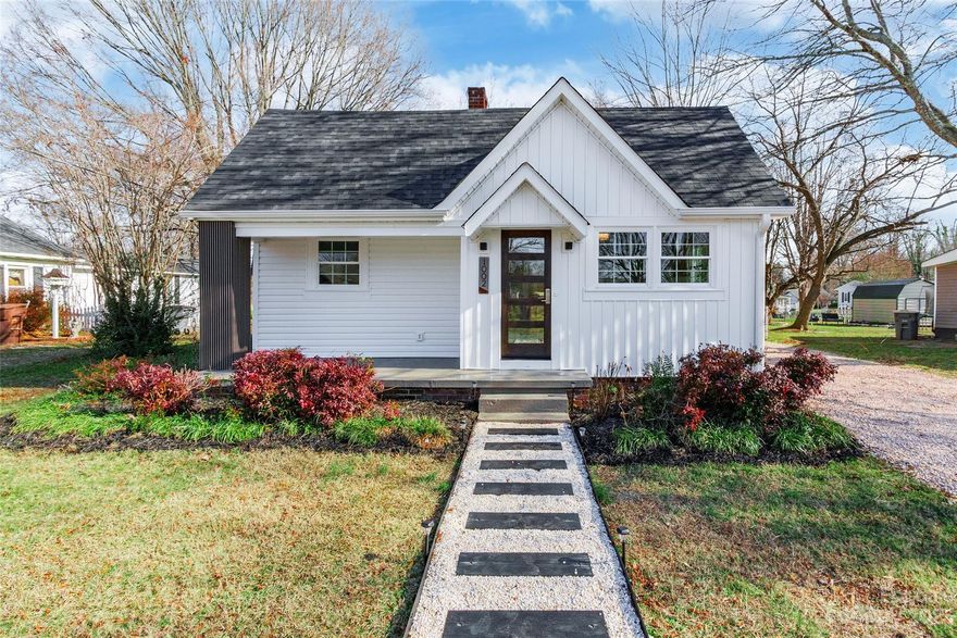 Step into the charm of this adorable 2 bedroom, 1 bath home that beckons with an open floor plan, adorned with gorgeous wood and tile floors throughout. The heart of the home, the kitchen, is a delightful space boasting a window over that sink, a tasteful backsplash, and gorgeous granite countertops paired with stainless steel appliances. Recent updates, including new doors, windows, electrical, plumbing, and appliances, ensure a modern and efficient living experience. Beyond the interiors, a generous yard awaits, accompanied by a welcoming deck, perfect for enjoying the outdoors. This home is a perfect blend of comfort and contemporary style, inviting you to create lasting memories in a space that feels truly special.