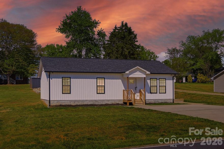 This stunning home boasts remarkable curb appeal, inviting you with its charming exterior and well-maintained flat yard, perfect for outdoor activities and gatherings. Located conveniently close to downtown Granite Falls, residents will enjoy easy access to a variety of local restaurants and amenities. With quick access to Highway 321, commuting to Hickory, North Carolina, is a breeze. 

Inside, the newer construction features an open floor plan that enhances the sense of space and flow. Beautiful design touches throughout the home, including stylish fixtures and modern finishes, create an inviting atmosphere. The spacious kitchen is a highlight, equipped with stainless steel appliances and ample counter space, making it ideal for both cooking and entertaining. Each room is designed to maximize comfort and style, making it a perfect retreat for relaxation after a long day.

Don't miss the opportunity to own this beautiful home that combines modern living with convenience and charm. Whether you're a first-time buyer or looking to relocate, this property offers a perfect blend of comfort and accessibility to all that Granite Falls has to offer!