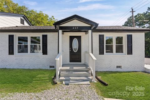 Photo of 403 Julius Chambers Avenue, Mount Gilead, NC 27306 (MLS # 4298336)