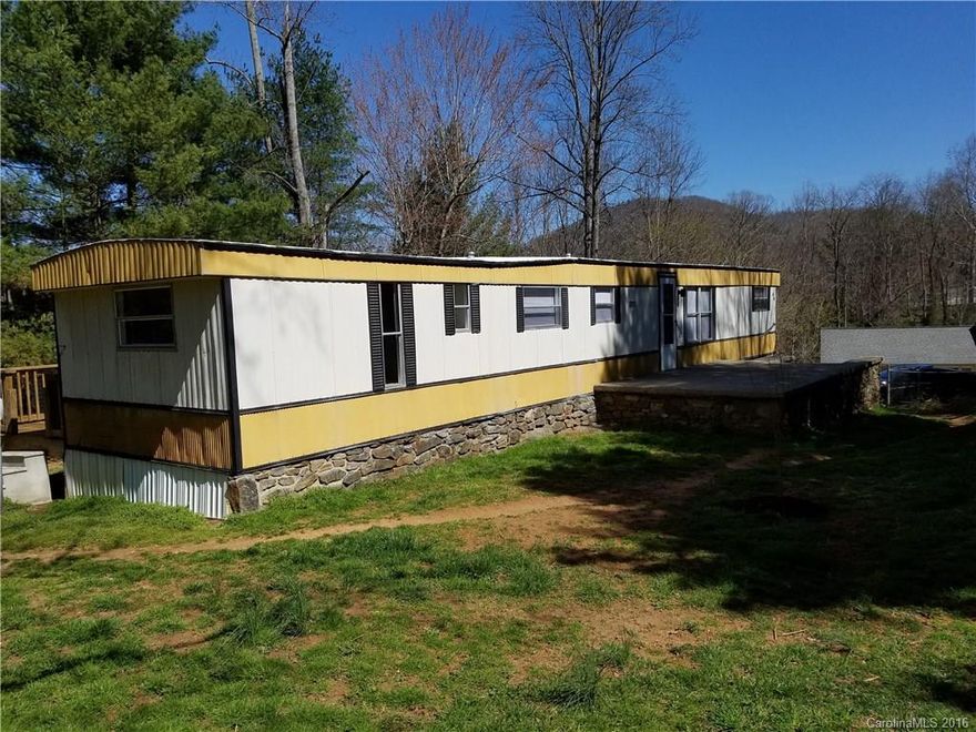 Renovated mobile home on nice lot.  New Plumbing, Roof resurfaced. New stone patio and back deck with fenced in yard.  Minutes from River arts, North Asheville amenities & I26.  Great rental history.  Financing available for qualified buyers with Champion Credit Union and TD bank.