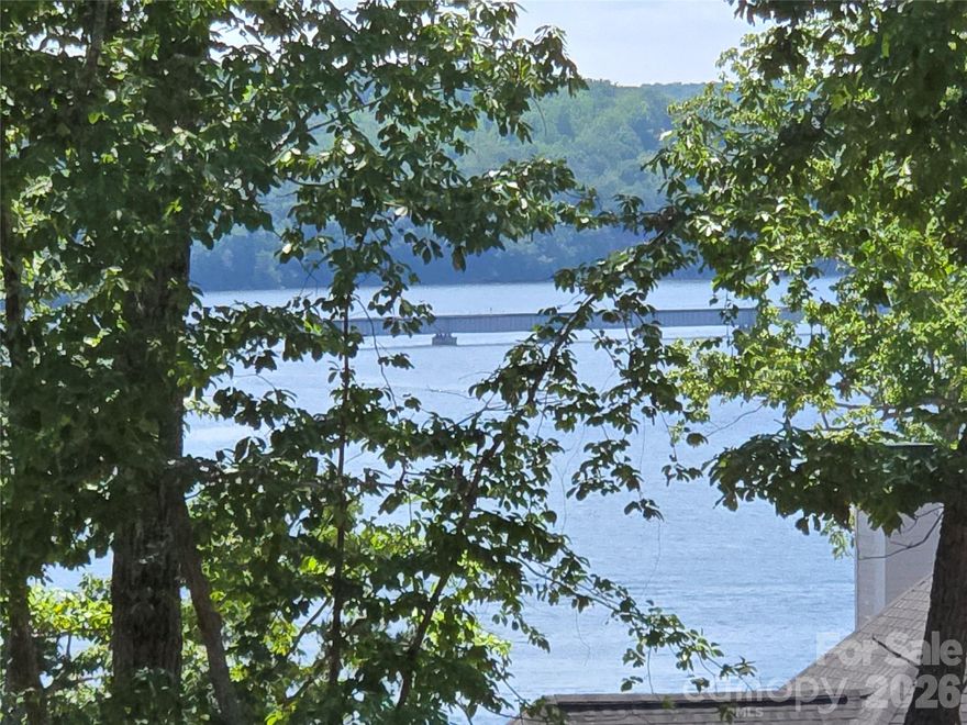 This premium Badin Lake water view lot is located in the prestigious gated community of Heron Bay. Great location in the hot Kingfisher Ct. section. Year-round views of the Main Channel. 1.2 acres. Come build your dream home or weekend get away on this ideal water view lot situated high above & overlooking the waterfront homes. Previously permitted for 3 bedrooms. The neighborhood includes a club house, community boat slips, paved boat ramp, walking trails & boat/RV storage. Heron Bay owners have the opportunity to join the adjacent Old North State Country Club. The Old North State Club offers a highly ranked golf course, marina, club house, restaurant, pool, tennis courts & more. Club opportunities require membership. Badin Lake has marinas that provide dining, gas & watercraft rental. The Uwharrie National Forest nearby is a great destination for camping, hiking, horseback riding & ATV/OHV trails. Within one hour from Charlotte, Greensboro & Winston-Salem. Look for the for sale sign.