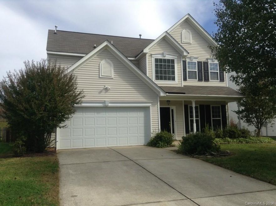 This beautiful home has a open floor plan, attached 2 car garage, and a back deck. There are hard wood floors and a fireplace in the living room.  The kitchen is bright and inviting and has a breakfast bar, all kitchen appliances, and a pantry.  There is a bedroom located on the first floor.  The master bathroom has dual sinks, over-sized tub, and separate shower.