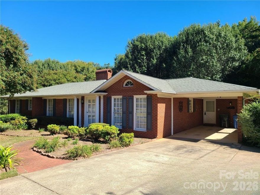 Don’t miss this one! Rare Opportunity in the Heart of Mint Hill – Residential Living with Flexible Use Capability! Welcome to this unique property located within the highly desirable Mint Hill Downtown Overlay (DO-A) zoning district.   

This property features an 1,889 SF single family home with a functional layout and flexible living spaces. In addition, there is a separate driveway leading to a fully refurbished 2,110 SF office/workshop building with its own electric meter and services—suitable for workshop, office, storage, hobby use, or potential business-related functions subject to zoning guidelines.(1489 HSF + 110 SF Utility Storage + 510 Shop Space).
Zoning highlights allow for certain customary home occupations and business uses while maintaining the residential character of the property. 

This property creates a fantastic opportunity for buyers seeking flexibility for a home office, studio, workshop or small-scale business operation, while enjoying a residential setting.  The property’s prime location just minutes to Mint Hill, Matthews, and major commuter routes further enhances its appeal—offering convenience, visibility, and long-term potential. Whether you’re looking for a primary residence, a live/work opportunity, or a property with future zoning flexibility—this one offers options that are hard to find in today’s market.