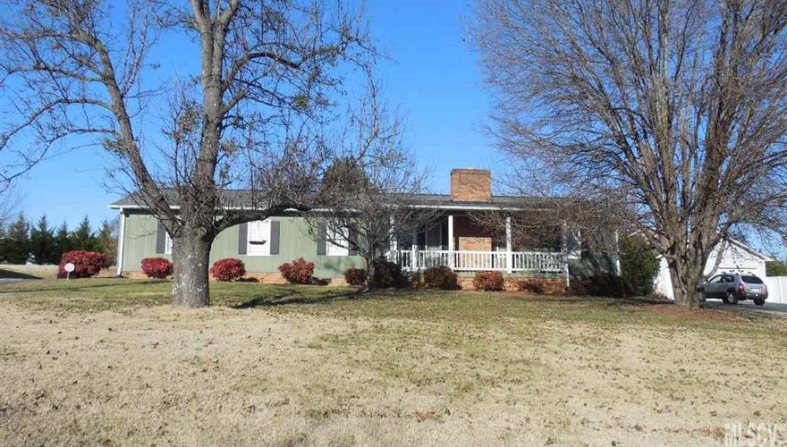 This 4 bedroom, 3 full bath home is one level with a level lot. The great room has a rock fireplace & laminate floors. The dining room has laminate as well & leads to a large deck. Split bedroom floor plan. The kitchen has stainless appliances, tile floors & a double pantry. A master wing was added in 2007 with a bedroom, full bath & sitting area. The master tub is oversized & jetted, separate shower. A large walk-in closet was added as well. Roof, heat & air updated in 2007. A 24x24 garage added in 2007.