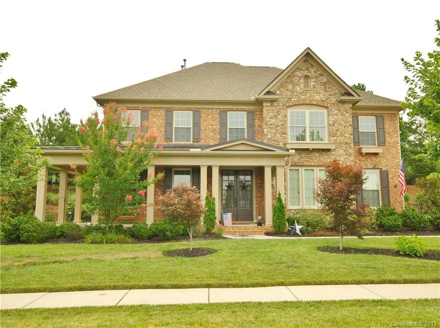 Beautiful full brick home w/ stone accents & rocking chair front porch on cul-de-sac w/ private flat back. Gourmet kitchen w/ huge island, upgraded cabinets, granite, stainless steel appliances, tile back splash & gas range. Large great room w/ built-ins & gas logs. Huge master w/ tray ceiling, bath w/ ceramic shower, garden tub, water closet & walk-in closets. Bonus loft w/ built-ins. Oil rubbed bronze fixtures throughout. Guest bedroom & bath on main. 3-car side load garage.