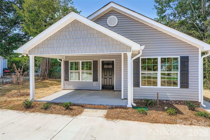 Exciting new construction in the heart of Rock Hill!  Don’t miss your opportunity to own this beautifully designed 3-bedroom, 2-bath home located in the growing and vibrant downtown Rock Hill area. This home offers a bright, open layout filled with natural light thanks to large windows throughout. The spacious kitchen is a showstopper with sleek granite countertops, a modern island, and plenty of room for gathering. Every corner of this home exudes comfort and peaceful living, ideal for anyone seeking a fresh start in a serene and modern space. Experience the charm of Rock Hill, known for its welcoming community, access to parks, shops, and excellent schools. With its newness and thoughtful design, this home promises both style and tranquility.  Come check it out and make this brand new house your home!  THIS HOME QUALIFIES FOR A $10,000 DOWNPAYMENT GRANT FROM WELLS FARGO HOME LOANS!  Call for more info-