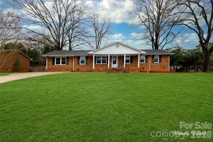 Step into effortless living in this beautifully updated brick ranch, tucked away in the highly sought-after Winthrop Heights subdivision. This home perfectly balances its established architectural roots with contemporary upgrades, featuring fresh paint, modern fixtures, and brand-new appliances. The expansive layout is designed for both connection and privacy, anchored by a great room with a fireplace and custom built-ins in the living room. Culinary enthusiasts will appreciate the sleek quartz countertops that flow through the kitchen and into every bathroom, where integrated LED backlit mirrors provide a sophisticated, modern glow. With two dedicated primary suites, a massive sunroom filled with natural light, and a fenced backyard, this property offers a rare combination of versatility and style. Whether you are enjoying a quiet morning on the front porch or hosting dinner in the formal dining room, every corner of this home is built for a life well-lived.