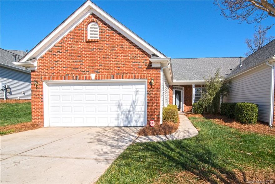 END UNIT-only one other adjoining villa. Open Palmetto plan! Formal living, Dining, Great Rm w/ gas fireplace Kitchen w/ bar-island, sep. breakfast, gorgeous 42" cabinets, GRANITE, upgraded appliances, DOUBLE OVENS, micro, dishwasher, smooth cooktop, REFRIGERATOR remains! Huge Master BR large enough for sitting area, lg walk in closet, master BA w/ over-sized shower, plus garden tub. Washer/Dryer included! Lovely backyard patio. Fresh paint-move-in ready! Four Seasons-FUN 55 & better community!