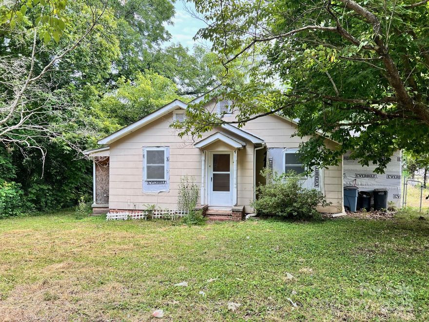 Fantastic opportunity to finish a work in progress for a great price. Almost 1300 square feet with a sweet cottage-style floorplan with ample storage and room to roam outside. Seller enclosed the screened porch to make a mud-room/drop zone that will greet you when you come home each day. Sizable living room opens to the dining room that can also be used as a home office or extra entertaining space. Just off the spacious kitchen is a rare pantry/laundry room with plenty of extra storage. The bedrooms are spacious and bright and one of the bathrooms has been renovated. With a little bit of ingenuity and a can-do attitude, this house can quickly become the home of your dreams. Great for an investor or a handy buyer who is looking for a home project to add personal touches.