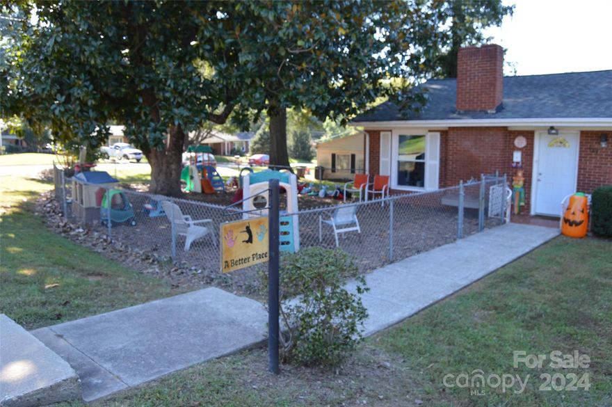 This is an outstanding opportunity to own your own day care business. The property is well maintained and in a great location in Statesville next to the Martin Luther King Park off Hartness Road.  The property is being used as a child day care facility and is licensed with the State of North Carolina for 28 children. The subject property has three classrooms, two bathrooms and a kitchen. The windows have been replaced along with numerous other improvements to operate as child day care center. All trade fixtures and children's toys will convey with the sale of the property.