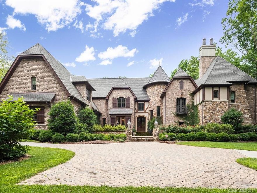 Elegant European French Country Arcadia custom built estate located on a 1.75 acre private wooded lot.  Luxury awaits you from the moment you enter. Graceful two story living room flooded with natural light.  Gourmet kitchen featuring custom cabinets, scullery, large walk-in pantry, viking appliances & granite countertops. Two story great room with stone fireplace & floor to ceiling windows.  Luxurious spacious Master suite.  Majestic Library with custom saltwater aquarium. Fully Equipped gym!