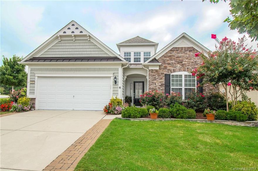 Home is on a cul-de-sac and corner lot surrounded by beautiful gardens. This one story ranch has 3 beds, 2 baths, with a separate office and sunroom - all very spacious feel and design! Upgraded SS appliances with hardwoods, and a gas fireplace in the great room. Very nice patio and two car attached garage. You won't be disappointed!