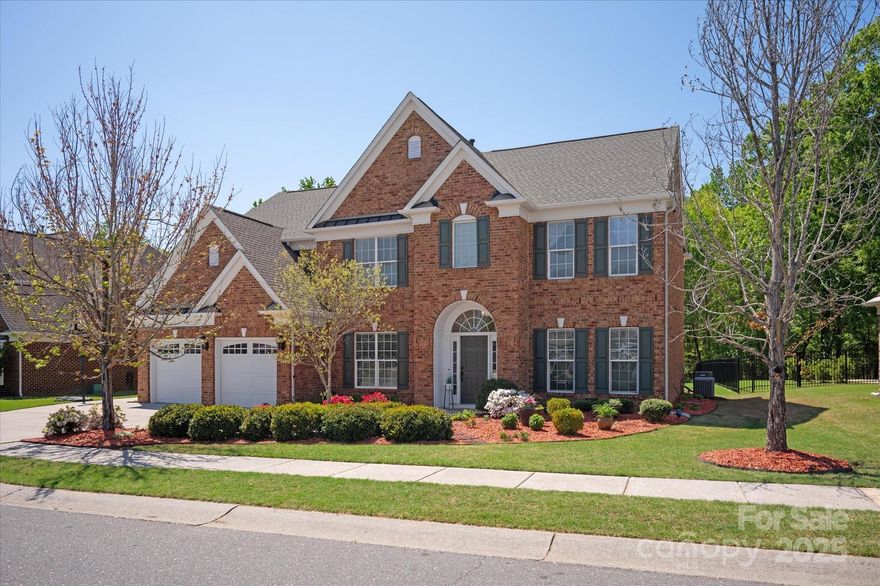 Stunning, move in ready Evanshire model in the highly desirable Chimneys of Marvin. Beautiful, private & flat lot that backs up to woods. Oversized custom covered porch with fireplace and plenty of room for entertaining. First floor dedicated office, dining and guest suite with access to a full bath. Open concept gourmet kitchen & 2 story great room with fireplace. Plenty of cabinets with center island, ss steel appliances, granite counters & computer niche. 2nd floor primary features a separate flex space, perfect for an exercise room, office or nursery. Spa like bath with soaking tub, separate shower & walk in closet. 2nd floor jack n jill bedrooms plus an additional bedroom with dedicated full bath. Incredible neighborhood amenities to include pool with waterslide, separate tot pool, tennis, volleyball & basketball courts, clubhouse & playground. Award winning Marvin Ridge Schools! 3 car garage and cul de sac location. Freshly painted!