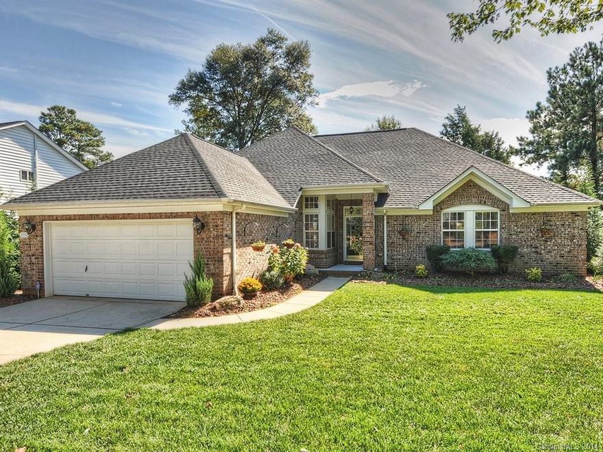 Must See! Gorgeous full brick ranch in waterfront community!!!  Extensive upgrades which include new roof, $60,000 sunroom addition, $50,000 kitchen remodel, $30,000+ landscaping to name a few.  Beautiful hardwood floors throughout with ceramic tile in kitchen and baths, Vintage wood tile in family room, marble floor in sunroom. Crawl space high enough for workshop. Located in a waterfront community with dry storage.  Close proximity to I-77, shopping/entertainment.  This one will not last long!