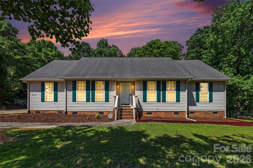 Welcome to Rock Hill living at its best! This beautiful 3-bedroom, 2-bath home at 809 Robertson Rd offers comfort, style, and outdoor fun all in one package. Step inside to find fresh paint throughout and no carpet anywhere, featuring durable updated LVP flooring in the bedrooms and classic wood floors in the main living spaces for a clean, modern feel. The kitchen has been refreshed with a brand-new sink featuring a touches faucet, while both bathrooms feature new faucets for an updated touch. Outside, the home truly shines with fresh mulch, improvements to the back porch, and a spacious fenced-in backyard perfect for pets, entertaining, or relaxing in privacy. Cool off all summer long in the above-ground pool, creating your own backyard retreat right at home. Whether you're a first-time buyer, downsizing, or looking for move-in-ready convenience, this charming property combines thoughtful updates with inviting indoor and outdoor spaces you’ll love coming home to. Cameras with security system to remain with home for added peace of mind.
