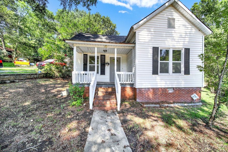 Completely updated home with covered front porch, screened in back porch, large kitchen with newly painted cabinets.  New windows, new laminate flooring throughout, fenced in yard.  2 Bedrooms with an updated full bath.  A must see!  This home was under contract for 1 day but the buyers financing fell through.