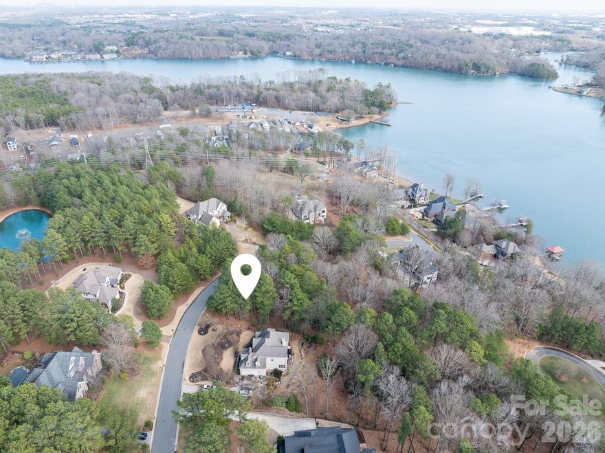 Welcome to this exceptional .67-acre homesite in the exclusive gated community of Reflection Pointe. Ideally situated and ready for your custom dream home, this spacious lot offers the perfect balance of privacy, elegance, and everyday convenience.

Residents enjoy resort-style amenities including a stunning clubhouse, sparkling swimming pool, tennis courts, scenic walking trails, and beautifully maintained parks. The neighborhood also features picturesque fountains, lake access, and secure boat storage — ideal for those who appreciate an active, waterfront lifestyle.

Located just minutes from the charm of downtown Belmont and the shores of Lake Wylie, this premier community blends natural beauty with upscale living. Don’t miss this rare opportunity to build your custom home in one of the area’s most desirable neighborhoods.