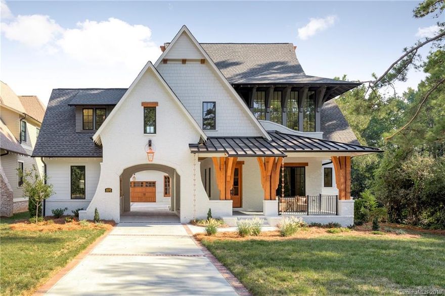 Gas lanterns flicker in the twilight and with the tap of a button, your home comes to life as you pull through the Porte Cochere. You walk inside, feed your pup at the built-in dog station, and grab some wine from the custom wine rack in your Scullery. A Thermador professional range awaits when you decide to exercise your inner chef while admiring an imported mosaic tile backsplash. Dine in a luxuriously appointed dining room, or alfresco on the rear screened-in terrace overlooking one of the largest yards in town. Retiring to the Owner's Retreat is a pleasure, with touchscreen shower controls, Restoration Hardware vanities, and designer chandeliers. Walking up the grand staircase, you are reminded that you have achieved one of your goals, and an inspiring home office awaits for you to achieve even more. Kids can play in their own playroom and won't be heard throughout the home. Your guest's biggest concern will be which bedroom they choose. Life is great. This is 4028 Churchill Road.