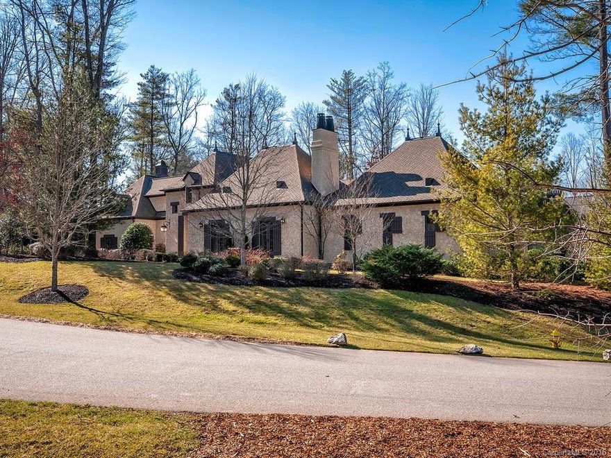 Amazing Jack Arnold French country design! Greeting you in the foyer, a handmade custom wrought iron design. Beautiful hardwood with cherry accents, soaring ceilings, beautiful beams, custom cabinets with leaded glass in the gourmet kitchen with spectacular pantry open to a breakfast and sunny hearth room. Spectacular grand room perfect for entertaining. Exquisite master suite with tremendous master closet and cherry library. Upper bedrooms are en suite, with computer station and media room.