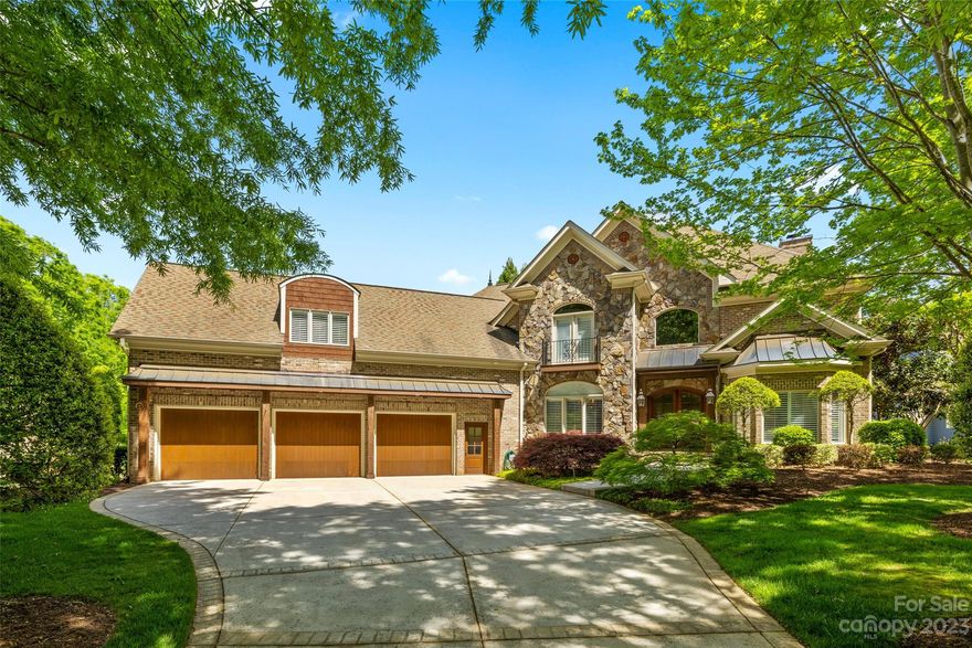 Exquisite 5BR 4.5 bath custom brick & stone residence built by Stonecraft Builders located in the picturesque Highgrove Community. The home features an incredible “oasis” for outdoor living including a heated spa pool, fireplace & outdoor kitchen all enclosed by a brick fence for privacy. Architectural details include exterior antique hand hewn columns on garage & porch, cedar & copper roof accents, mahogany doors & Bevelo gas lanterns. Dramatic entry w/ barrel ceiling & rope lighting. 11ft. coffered ceiling in Great Room, Gas fireplace w/ marble surround & tv mount. Heart of Pine flooring in formal rooms, foyer, great room, hallways & primary bedroom.  Kitchen & breakfast rooms boast travertine flooring, Chef's kitchen w/ pot filler, Viking gas range, new built in refrig. & wine chiller. Primary BR on main level w/trey ceiling & expansive windows. All upstairs bedrooms have adjoining baths w/ granite counters. Generous sized bonus room/media, Plantation blinds throughout, 3 car garage