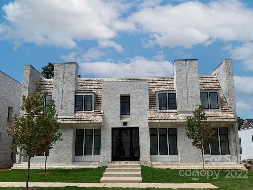 Fabulous newer construction in exclusive 10-home enclave in the Foxcroft area. This bright and airy home features an open, inviting floor plan, formal and informal living, beautiful flooring and walls of windows allowing for an abundance of natural light. The chef's kitchen has a gorgeous waterfall breakfast bar, Wolf and Sub-Zero appliances, white cabinetry and walk in pantry.  Main level primary suite with gorgeous spa bathroom and large walk-in closet. Spacious second floor bedrooms have generous closets and en-suite baths. A private brick-enclosed back yard with fireplace is perfect for entertaining and casual family living!  Great location - minutes to South Park and Uptown.