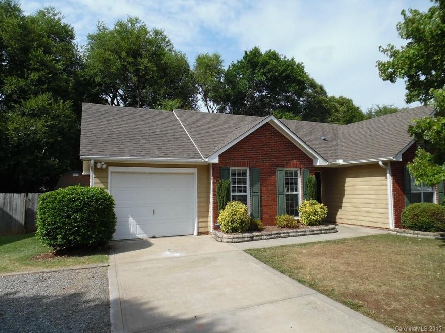 Wonderful 3BR 2Ba well cared for home.  Updated nickel light fixtures & laminate flooring.  Ceramic tile in kitchen , very nice deck overlooking private fenced yard with storage building.  Large master bath has garden tub & separate shower.  No HOA dues.