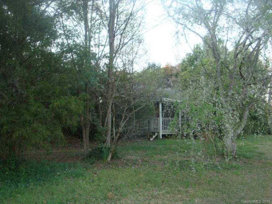 Home located on Golf Course, needs work, 4 bedrooms,3 baths,large level lot,needs updating and repairs, 2 car garage,subject to bankrupcy court approval, quick approval, HVAC does not work, bring all offers, sold as is , Reduced 9/02/2014 for quick sale, back on the market